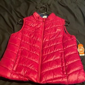 This is a reddish pinkish vest from wonder nation